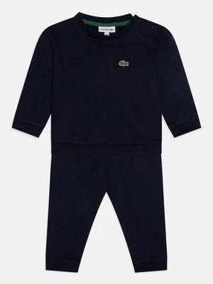 Dres Lacoste