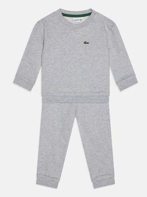 Dres Lacoste