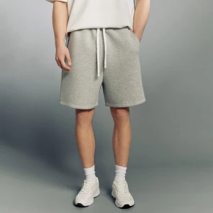 Dresowe jasnoszare szorty baggy z białą wstawką House