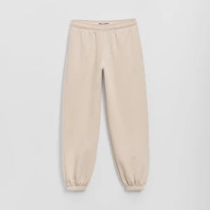 Dresowe joggery mid waist beżowe House