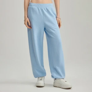Dresowe joggery mid waist błękitne House