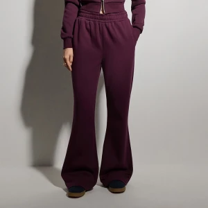 Dresowe spodnie dzwony z elastycznym pasem bordowe House