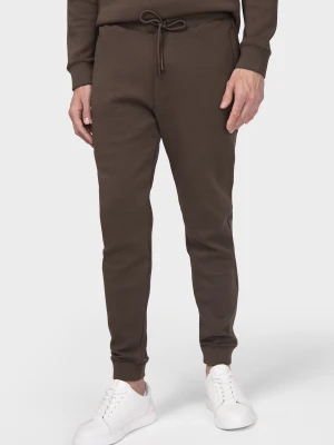 Dresowe spodnie TOMMASO 00010B80GRA Giacomo Conti brazowy