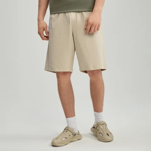 Dresowe szorty z nogawkami przed kolano beżowe House