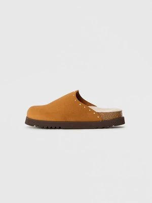 Drewniaki i Chodaki Scholl