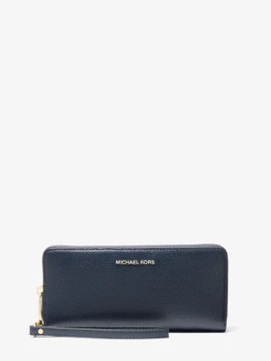 Duży podróżny portfel Jet Set ze skóry groszkowej Michael Kors GRANATOWY (Niebieski)
