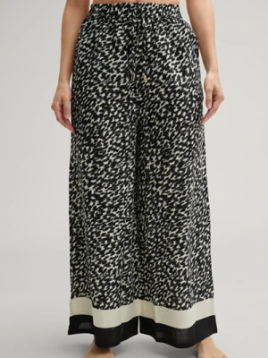 Dżersejowe spodnie z szeroką nogawką w panterkę w kolorze czarnym/białym Joop