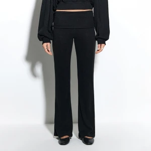 Dzianinowe czarne spodnie dzwony z wywijanym pasem House