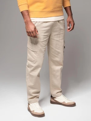 Dzianinowe męskie joggery z kieszeniami cargo – kremowe V1 Ombre Clothing