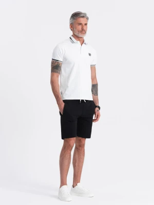 Zdjęcie produktu Dzianinowe męskie spodenki ze ściągaczem i kieszeniami - czarne V5 - Rozmiar: S Ombre Clothing