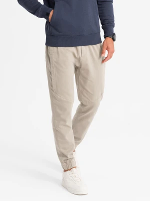 Dzianinowe spodnie męskie joggery z ozdobną plisą – popielate V1 - Rozmiar: XL Ombre Clothing