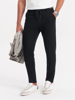 Dzianinowe spodnie męskie z gumką w pasie - czarne V4 OM-PACP-0116
 -                                    L