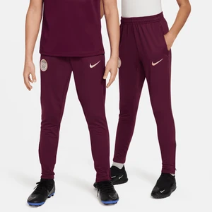 Dzianinowe spodnie piłkarskie dla dużych dzieci Nike Dri-FIT Paris Saint-Germain Strike - Czerwony