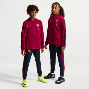 Dzianinowy dres piłkarski dla dużych dzieci Nike Dri-FIT FC Barcelona Strike - Czerwony