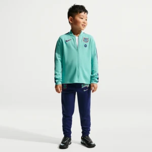 Dzianinowy dres piłkarski dla małych dzieci Nike Dri-FIT FC Barcelona Strike (wersja trzecia) - Zieleń