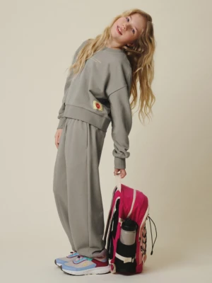 Dziewczęce spodnie dresowe 4F 4FJRSS26TTROF1871 - beżowe 4F JUNIOR