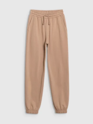 Dziewczęce spodnie dresowe joggery 4F 4FJWSS25TTROF1187 - beżowe 4F JUNIOR