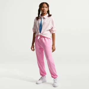 Dziewczęce spodnie o luźnym kroju Nike Studio Fleece - Różowy