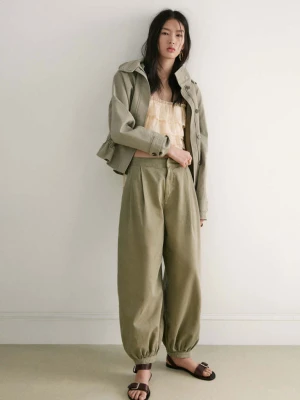 Jeansy haremki z średnim stanem khaki - Kobieta - - MANGO
