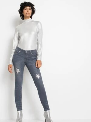 Jeansy skinny z niskim stanem, z nadrukiem gwiazdek bonprix