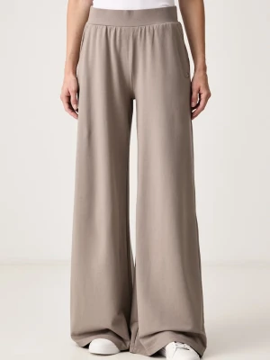 EA7 Emporio Armani spodnie dresowe damskie bawełniane z elastanem beżowy