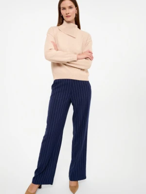 Efektowny beżowy golf z rozcięciem Greenpoint