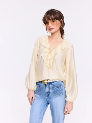 Elegancka bluzka z wiązaniem w masełkowym kolorze TARANKO