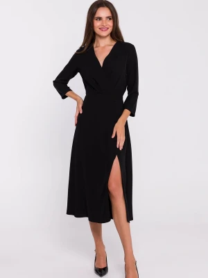 Elegancka sukienka rozkloszowana kopertowy dekolt czarna Stylove