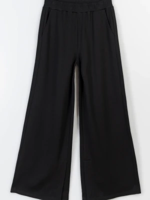 Eleganckie czarne spodnie z modnymi rozcięciami Reporter