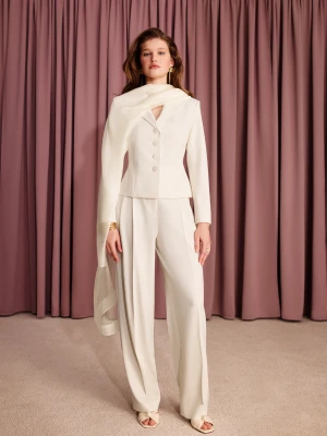 Eleganckie spodnie w białym odcieniu TARANKO