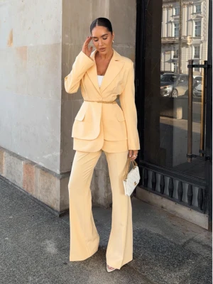 Eleganckie spodnie z kantem z wiskozy DONY - mango  magmac 