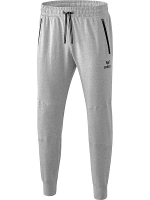 erima Spodnie dresowe "Essential" w kolorze szarym rozmiar: 164