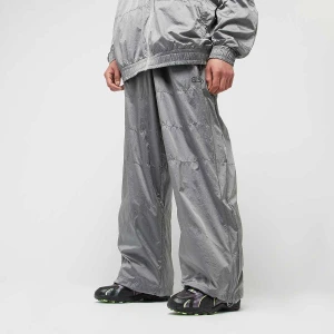 F1 T7 Oversized Track Pants, markiPUMA, Spodnie dresowe, w kolorze srebrny, rozmiar: