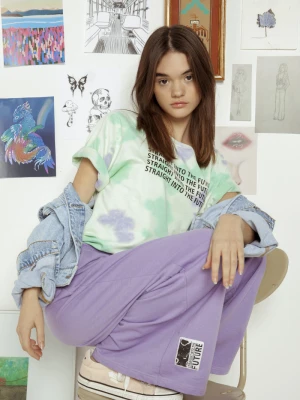 Fioletowe spodnie dresowe z szerokimi nogawkami Reporter