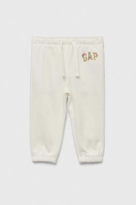 GAP spodnie dresowe dziecięce kolor biały z aplikacją