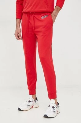 GAP spodnie dresowe męskie kolor czerwony gładkie