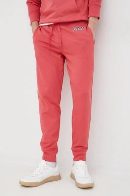 GAP spodnie dresowe męskie kolor różowy gładkie