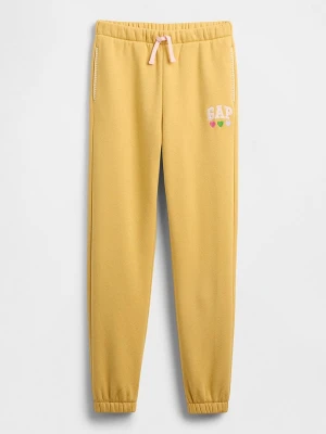 GAP Spodnie dresowe w kolorze żółtym rozmiar: 110