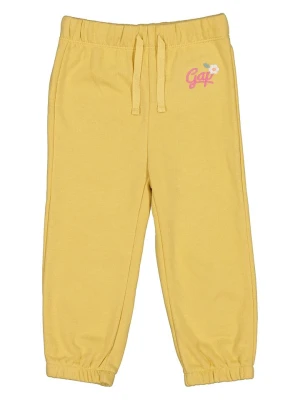GAP Spodnie dresowe w kolorze żółtym rozmiar: 92