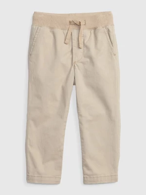 GAP Spodnie w kolorze beżowym rozmiar: 68/74
