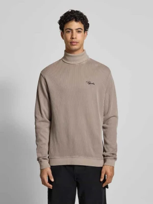 Golf z prążkowaniem i wyhaftowanym logo Pegador