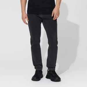 Grafitowe jeansy carrot fit House