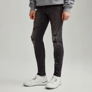 Grafitowe jeansy skinny fit z nadrukiem imitującym plamki farby House