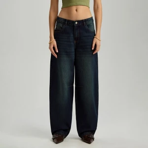 Granatowe jeansy baggy fit z przetarciami House