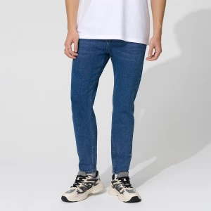 Granatowe jeansy carrot fit House