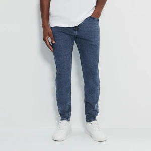 Granatowe jeansy carrot fit House