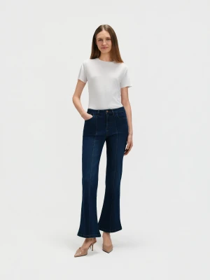 Granatowe jeansy flare z przeszyciami TOP SECRET