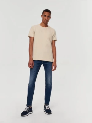 Granatowe jeansy skinny fit House