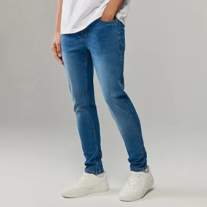 Granatowe jeansy skinny fit House