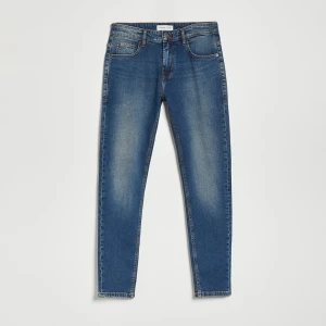 Granatowe jeansy slim fit House
